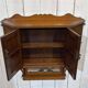 Early 20th-century English wall shelf in walnut.