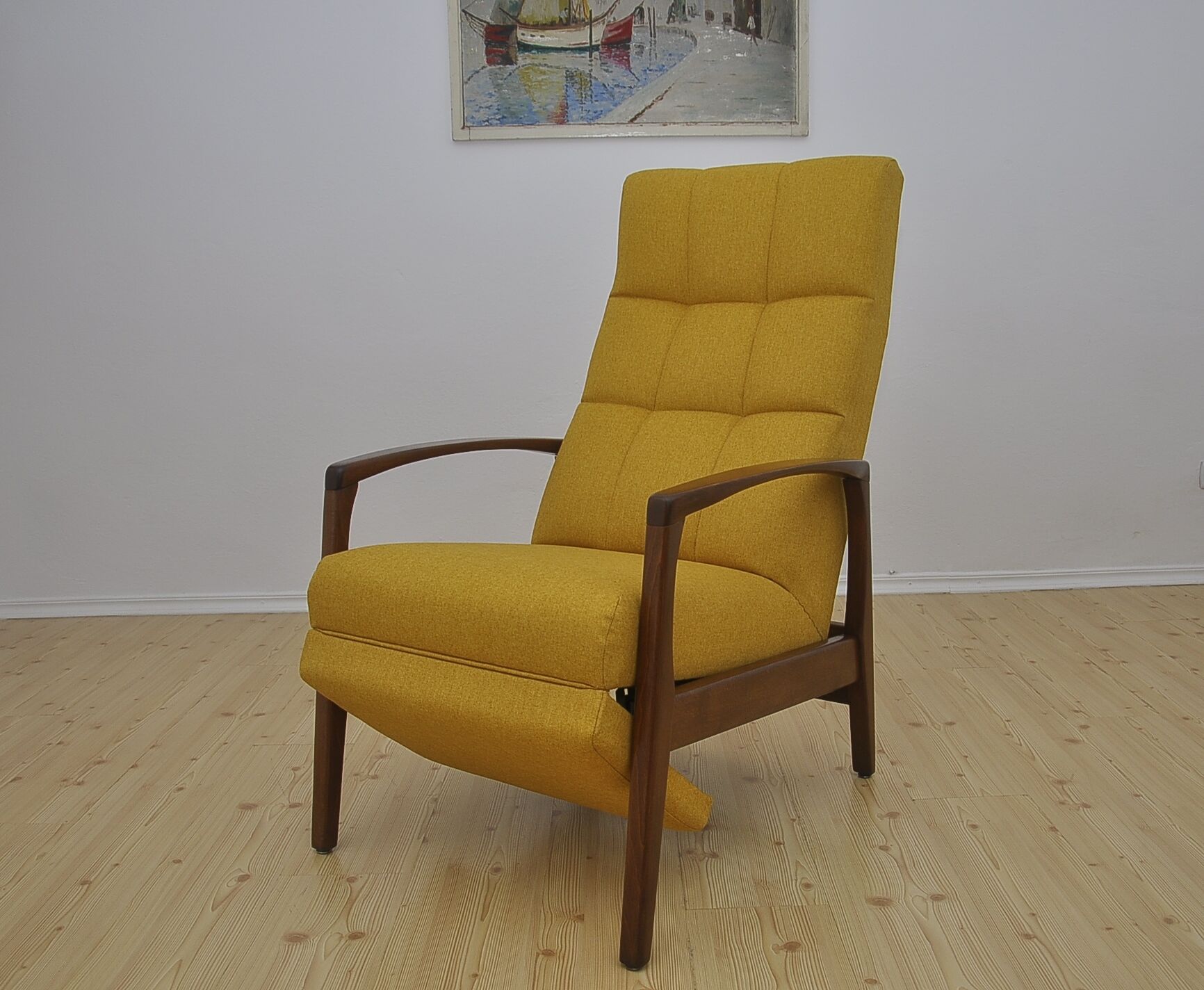 Mid-century armchair with folding footrest, 1960s