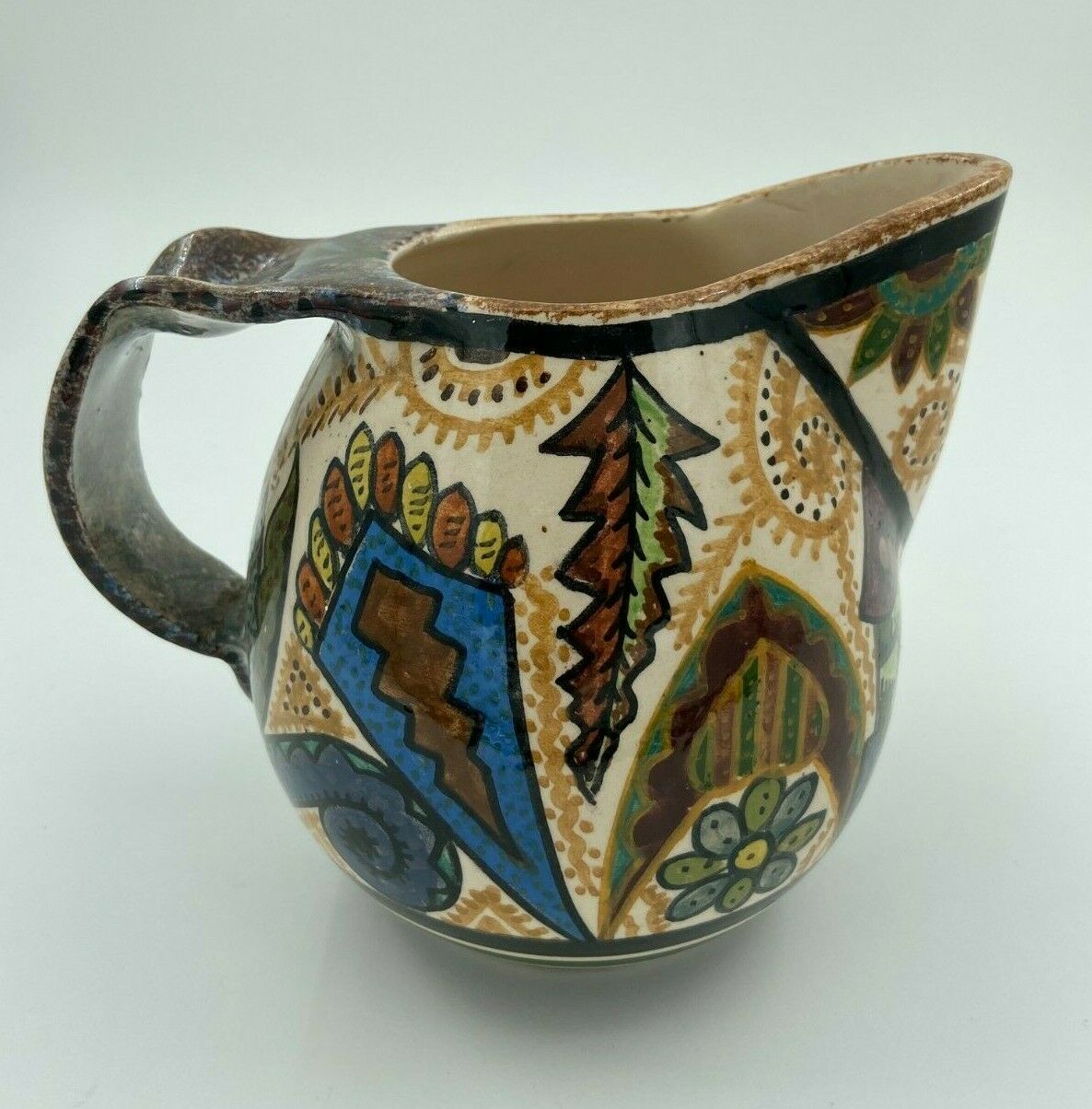 Pichet Paul Fouillen faience de Quimper decor geometrique signe