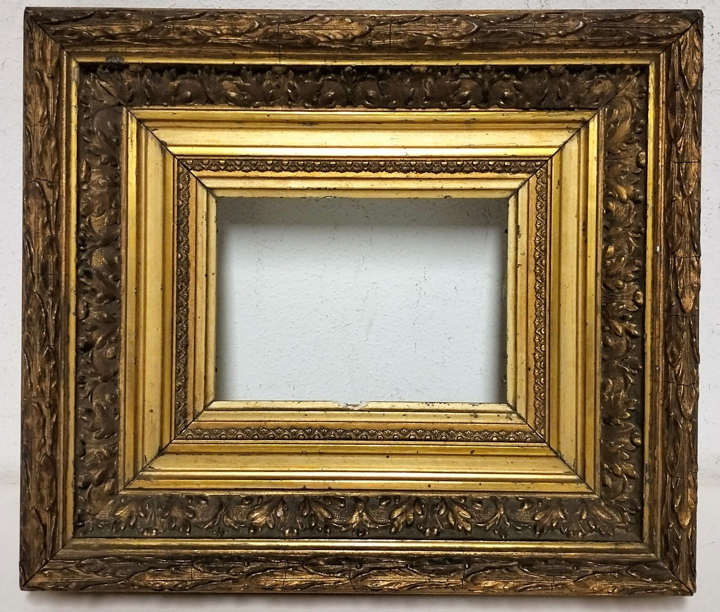 Frame wood and gilded stucco