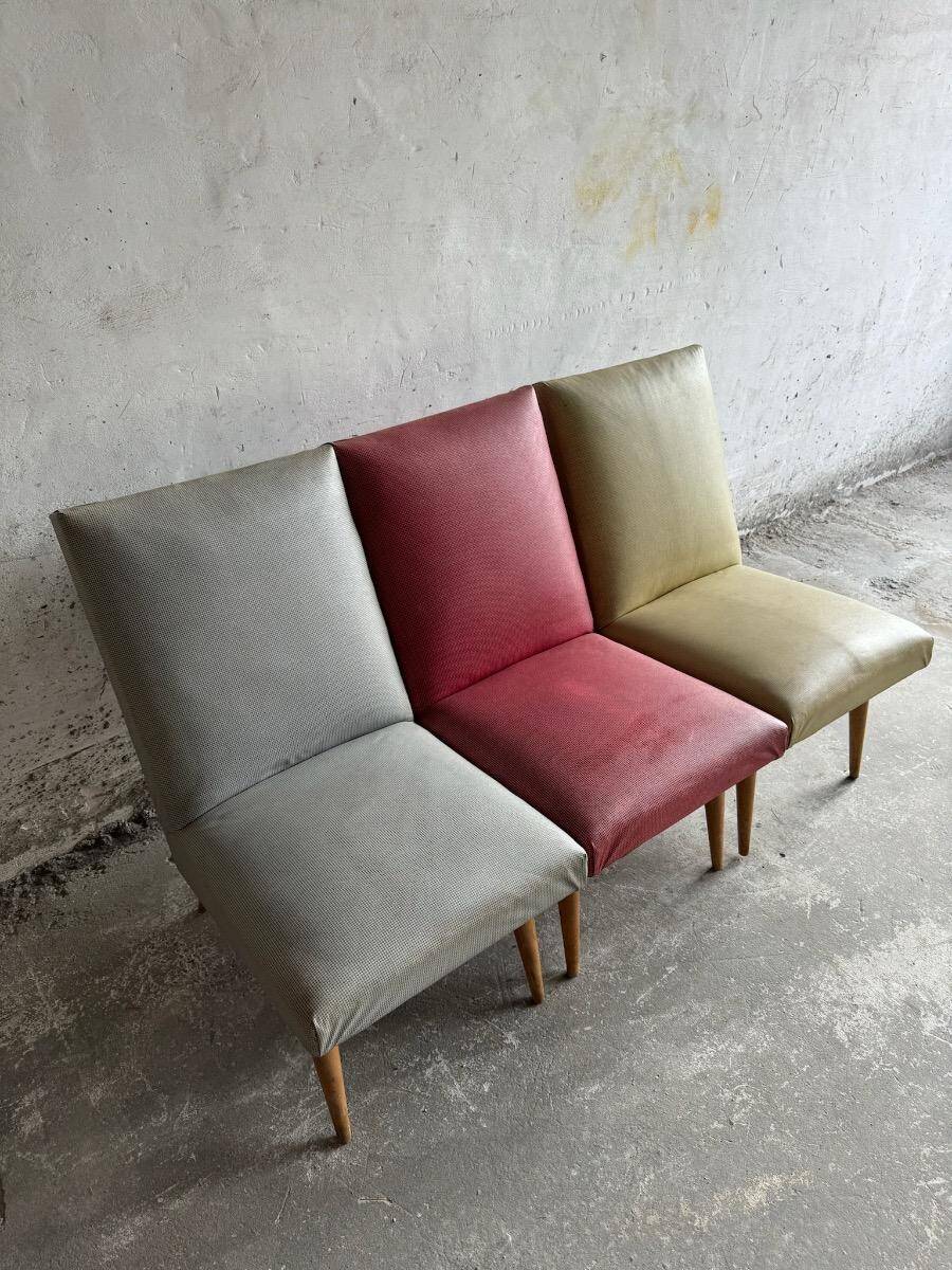 Set of 3 Mid-century club chairs — light blue, wine red & ochre textile with wooden legs