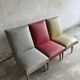 Set of 3 Mid-century club chairs — light blue, wine red & ochre textile with wooden legs