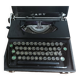 Japy portable typewriter, shiny black metal, 1950s