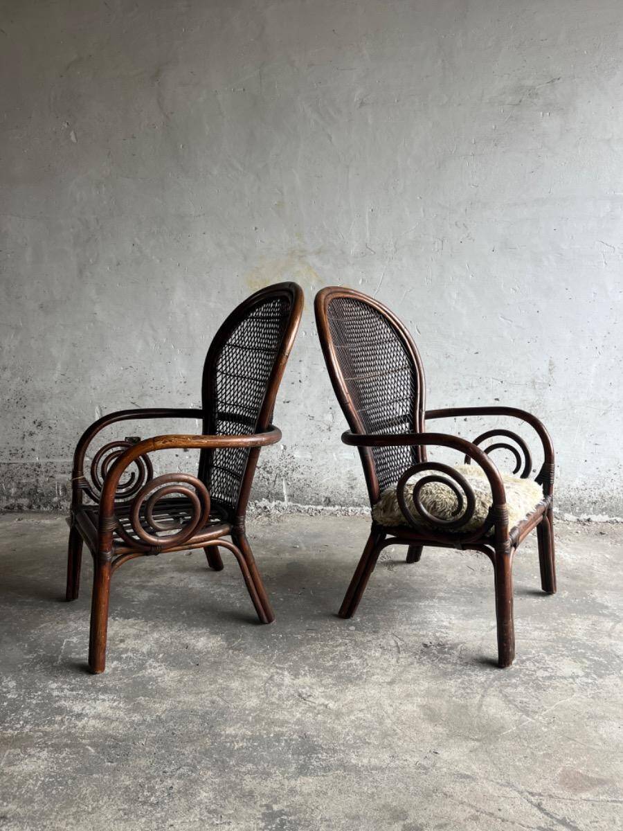 Mid-century Manou dark brown bamboo armchair with open rattan backrest, 1960s French