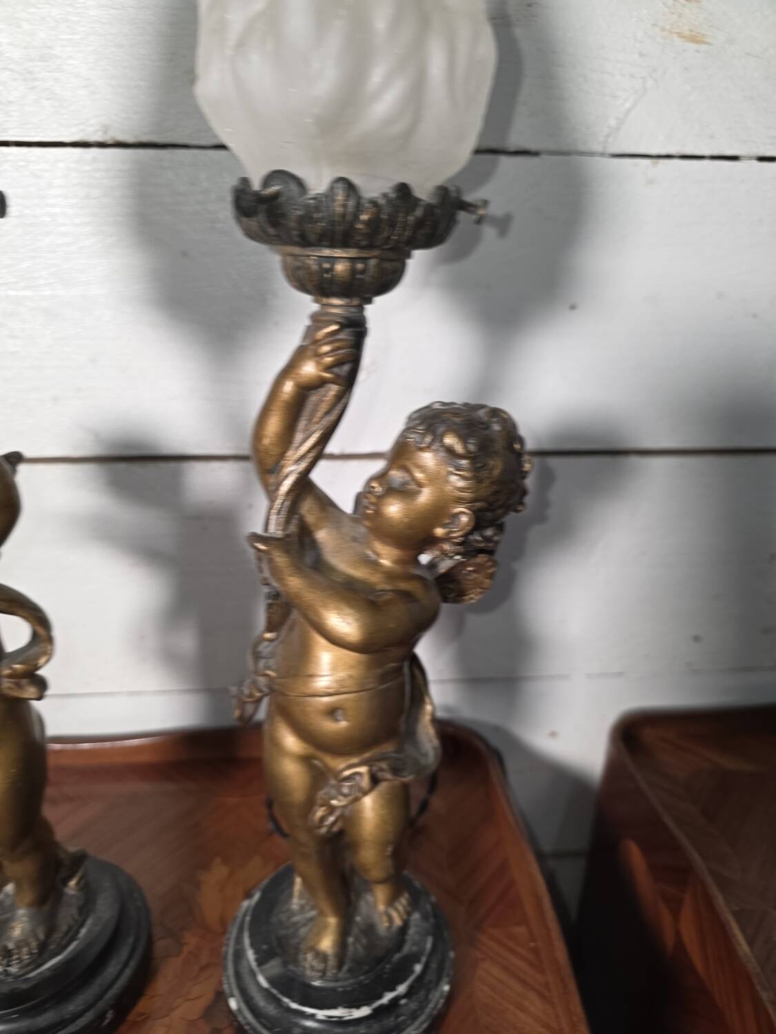 Pair of putti angel lamps from the 19th century.