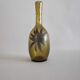 50-year-old soliflora vase in green bulled glass and pewter flower