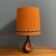 Lampe de table en céramique orange / marron des années 1960