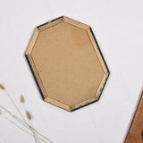 Old octagonal beveled mirror.