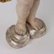 Ancient sculpture of a putto in carved and gilded wood, Italy, 19th century.