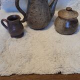 Set in vintage stoneware.