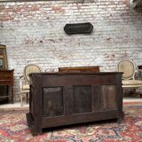 Chest in carved natural wood of the eighteenth century