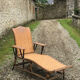 Old rattan lounger.