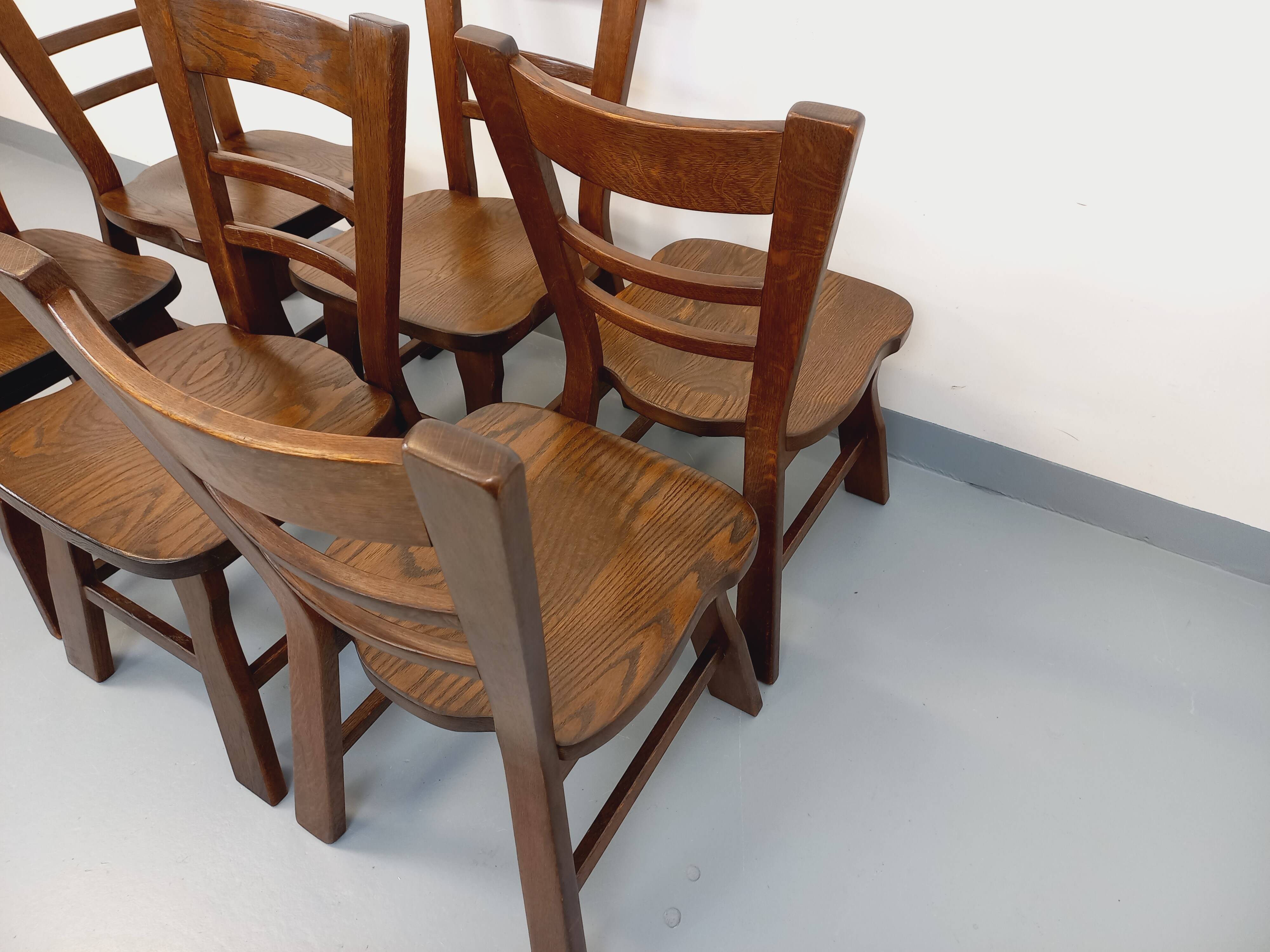 Set of 6 vintage brutalist oak chairs from the 1950s.