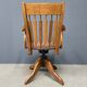Antique American oak office chair with armrests 1920s