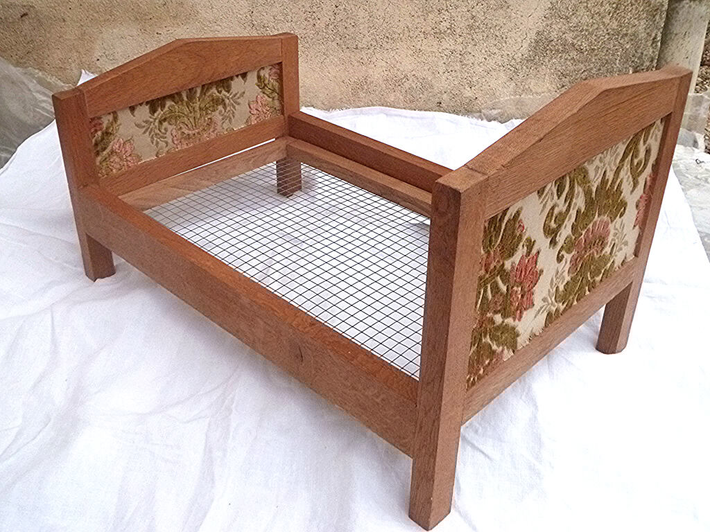 Vintage handcrafted wooden doll bed