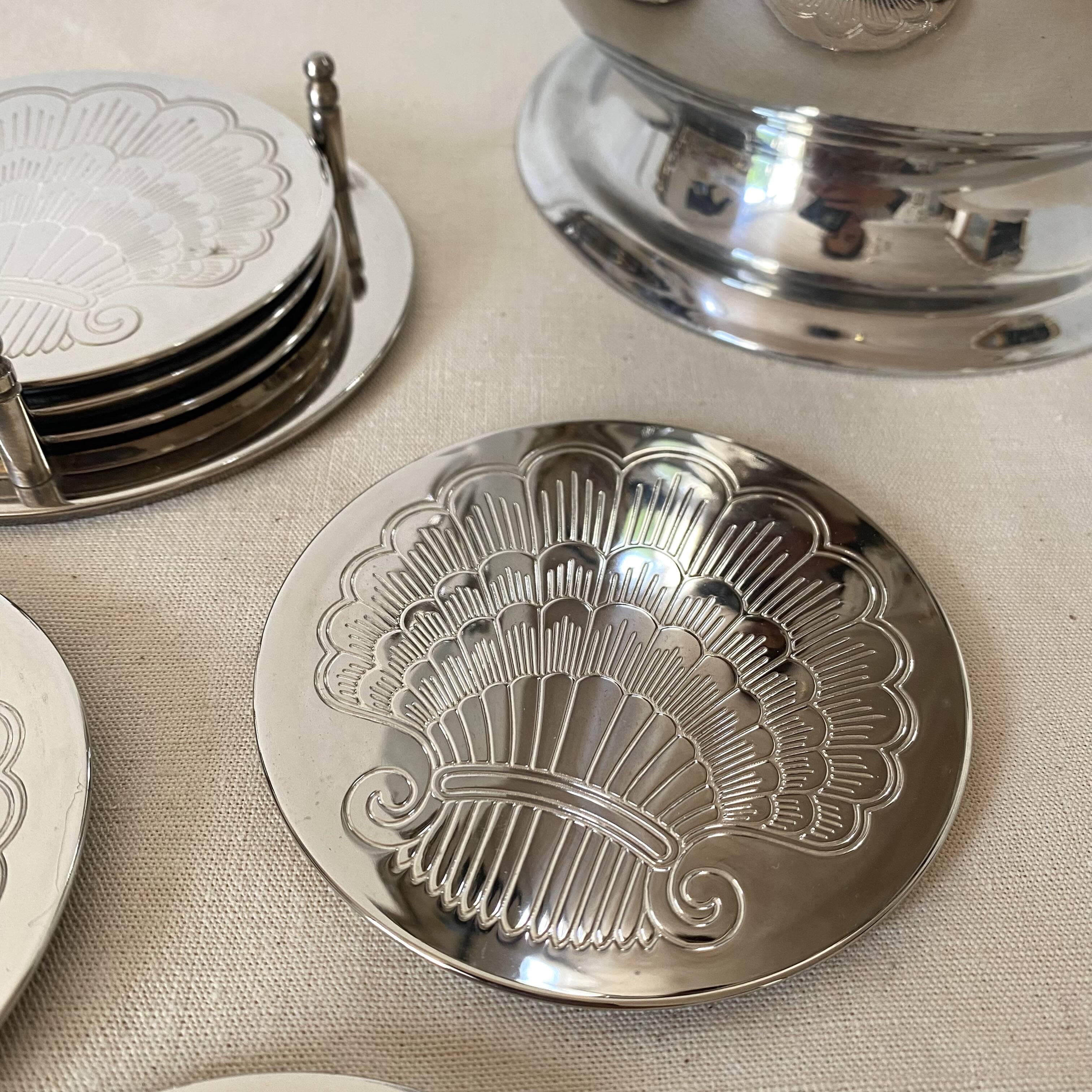 Silver coaster and holder, shell, 80s