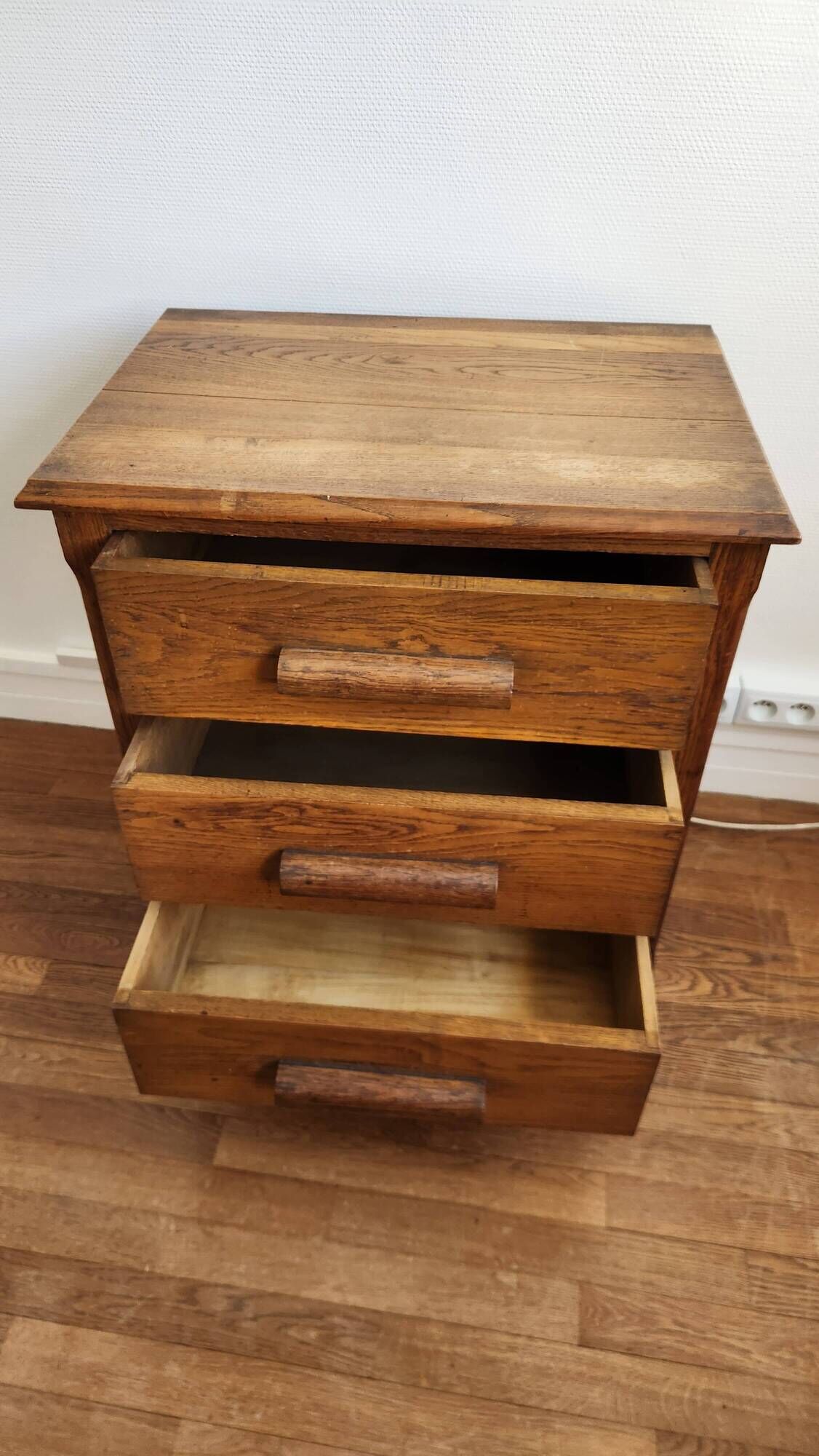 Beautiful old wooden furniture with three drawers.