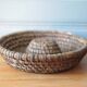 Old wicker basket, straw and bramble, woven basket, countryside, chalet, kitchen, interior decoration.