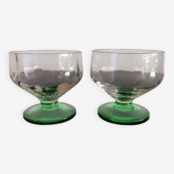 2 lightly faceted champagne glasses with green feet, 1930s