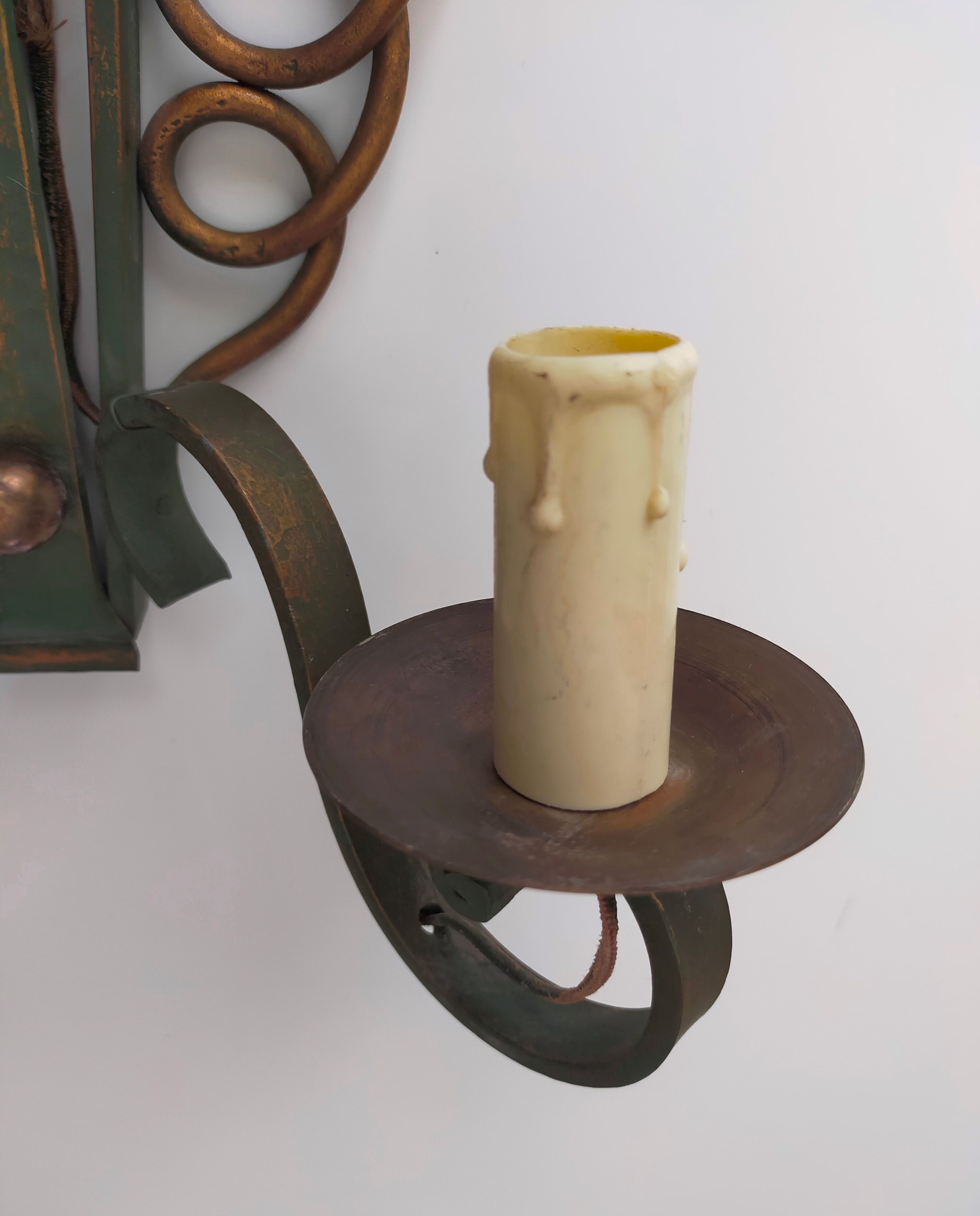 Pairs of vintage wrought iron wall lamps