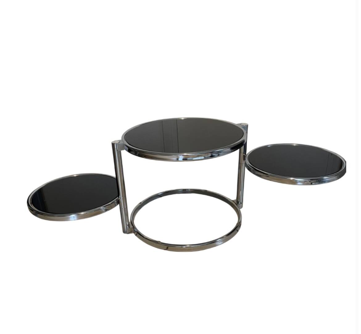 Coffee table with 3 chrome and smoked glass tops.