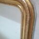 Golden Louis Philippe mirror H122xW84cm with gilded motifs.