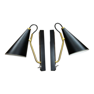 Pair of modernist sconces in black and gold metal