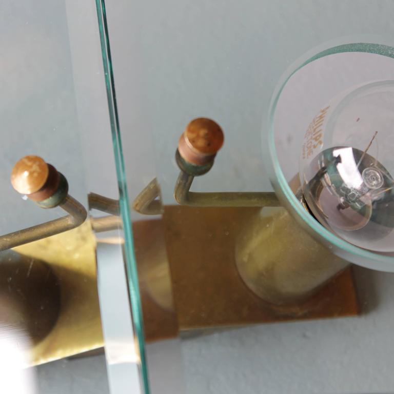 Italian applies in brass and glass cut by Arredoluce