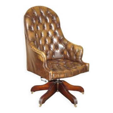 Vintage Chesterfield armchair in aged leather