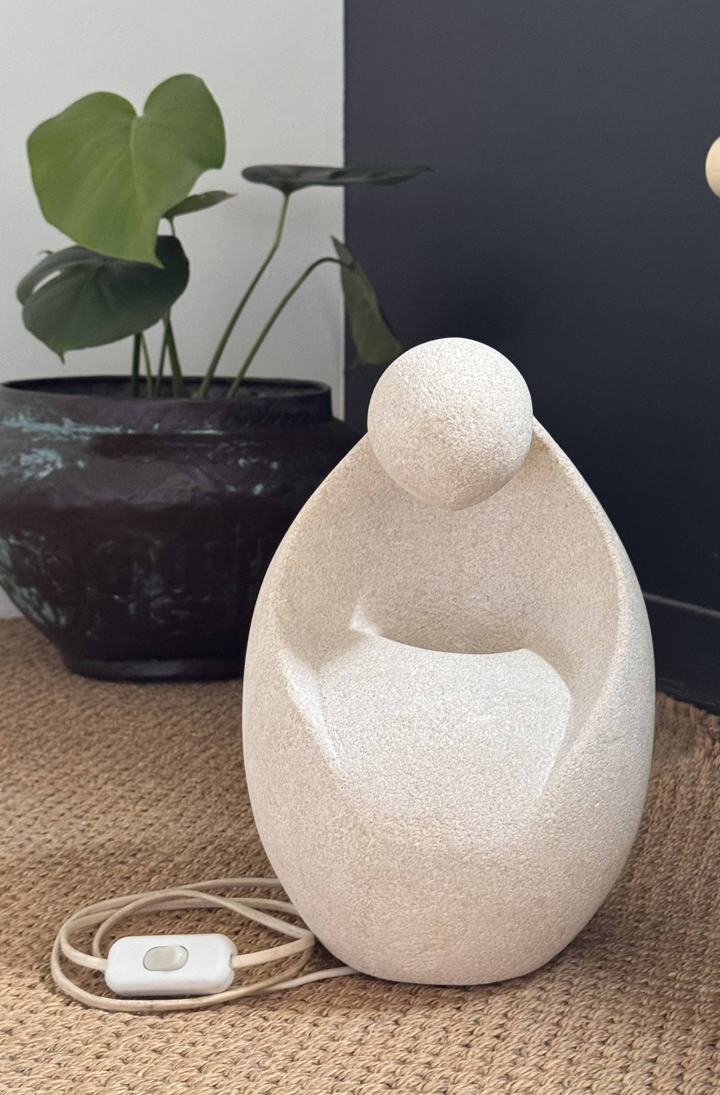 1970s lamp made of sculpted limestone by Gérard Esnault.
