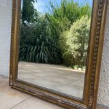 19th century Louis XVI style mirror in wood gilded with gold leaf, 74x150cm