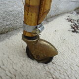 Rattan bassinet on folding support