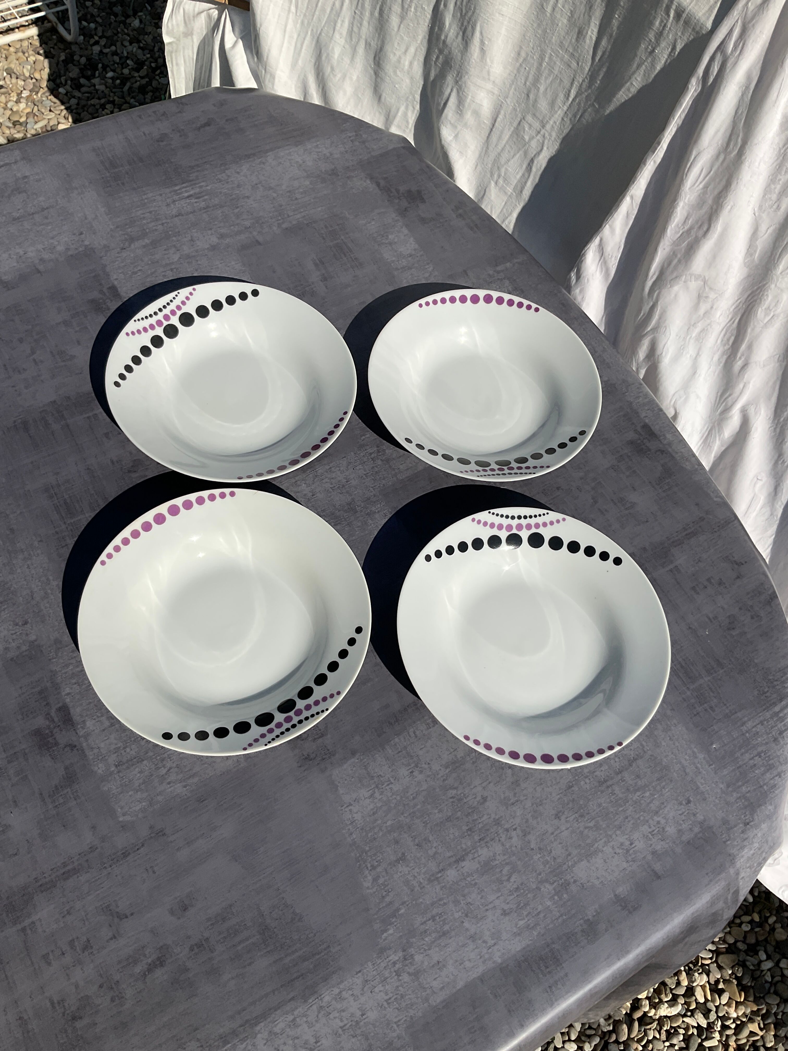 Vintage white hollow plates with purple polka dots