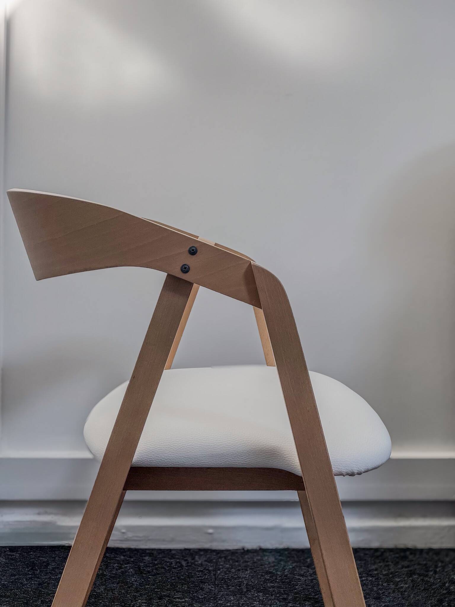 Professional chairs in beech and coated white textile