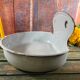 Old white enamelled hand washbasin or gardener enamel garden
