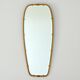 Superb free-form mirror in solid brass from the 50s/60s vintage.