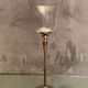 Glass photophore on high metal foot with silver patina