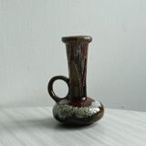 Vase en céramique émaillée avec motifs multicolores.
