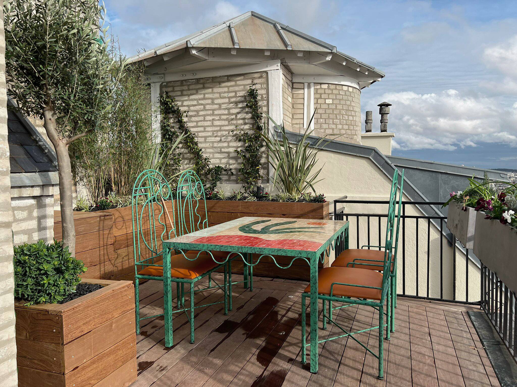 Lrnce garden furniture, in wrought iron and zellige