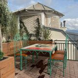 Lrnce garden furniture, in wrought iron and zellige