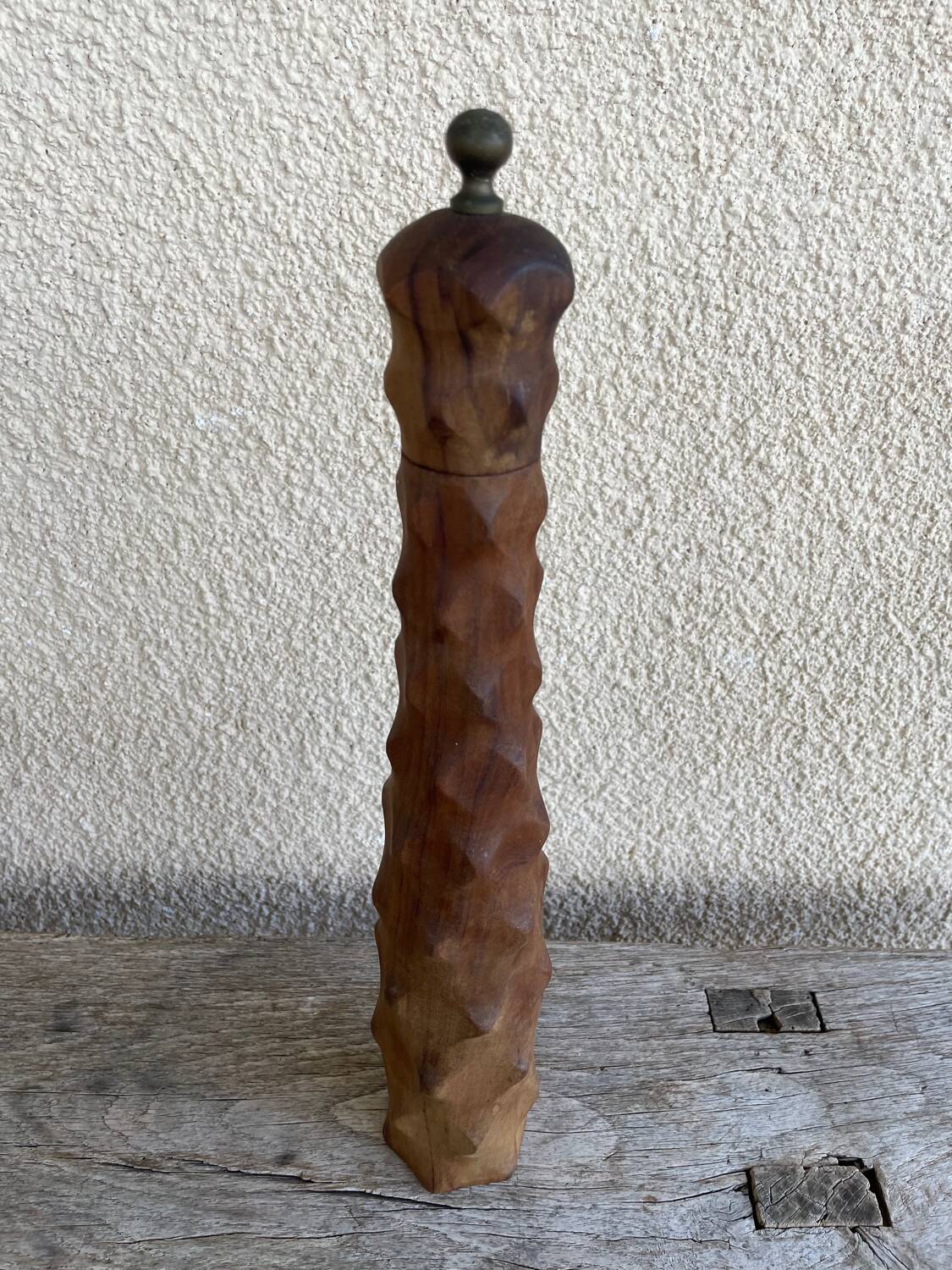Large carved wooden pepper mill
