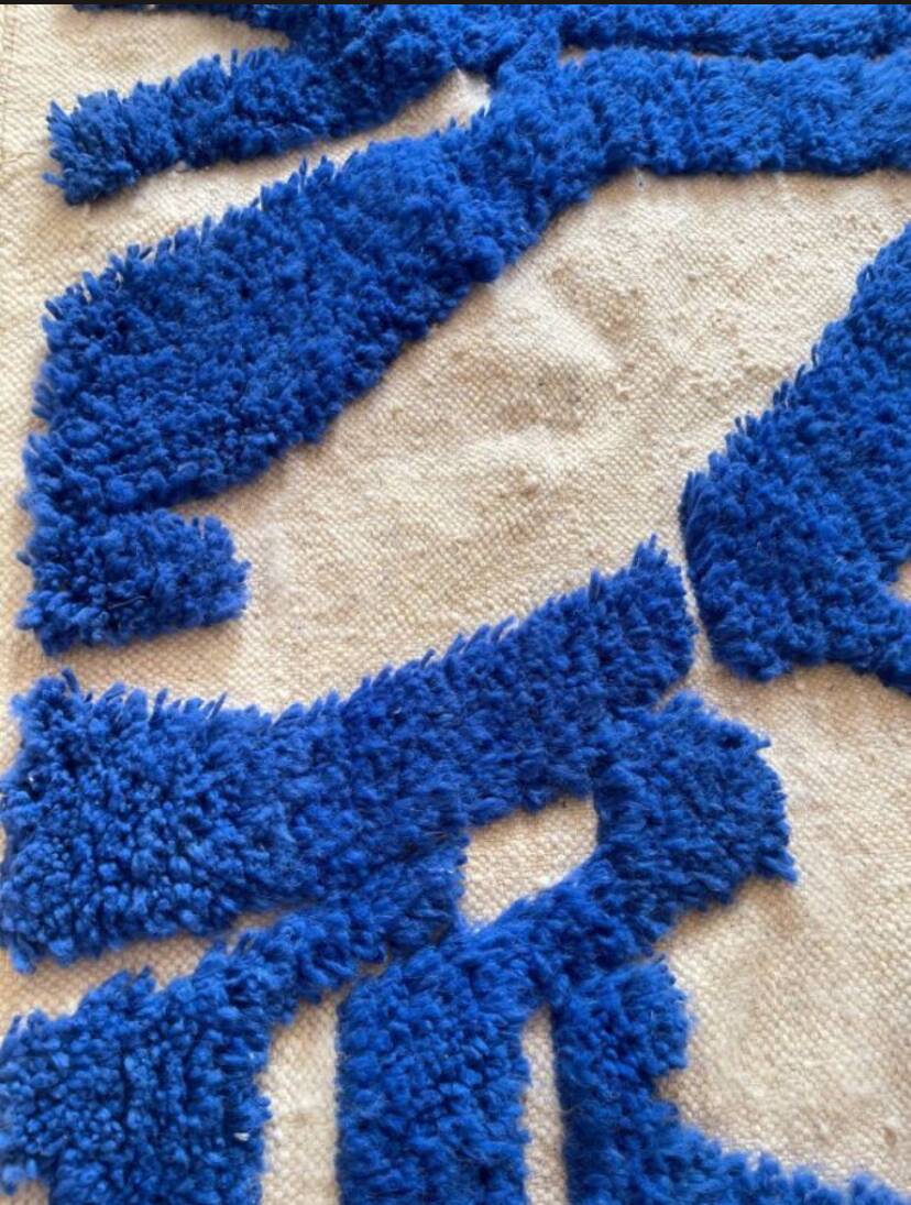 Wool rug with geometric patterns 200/300