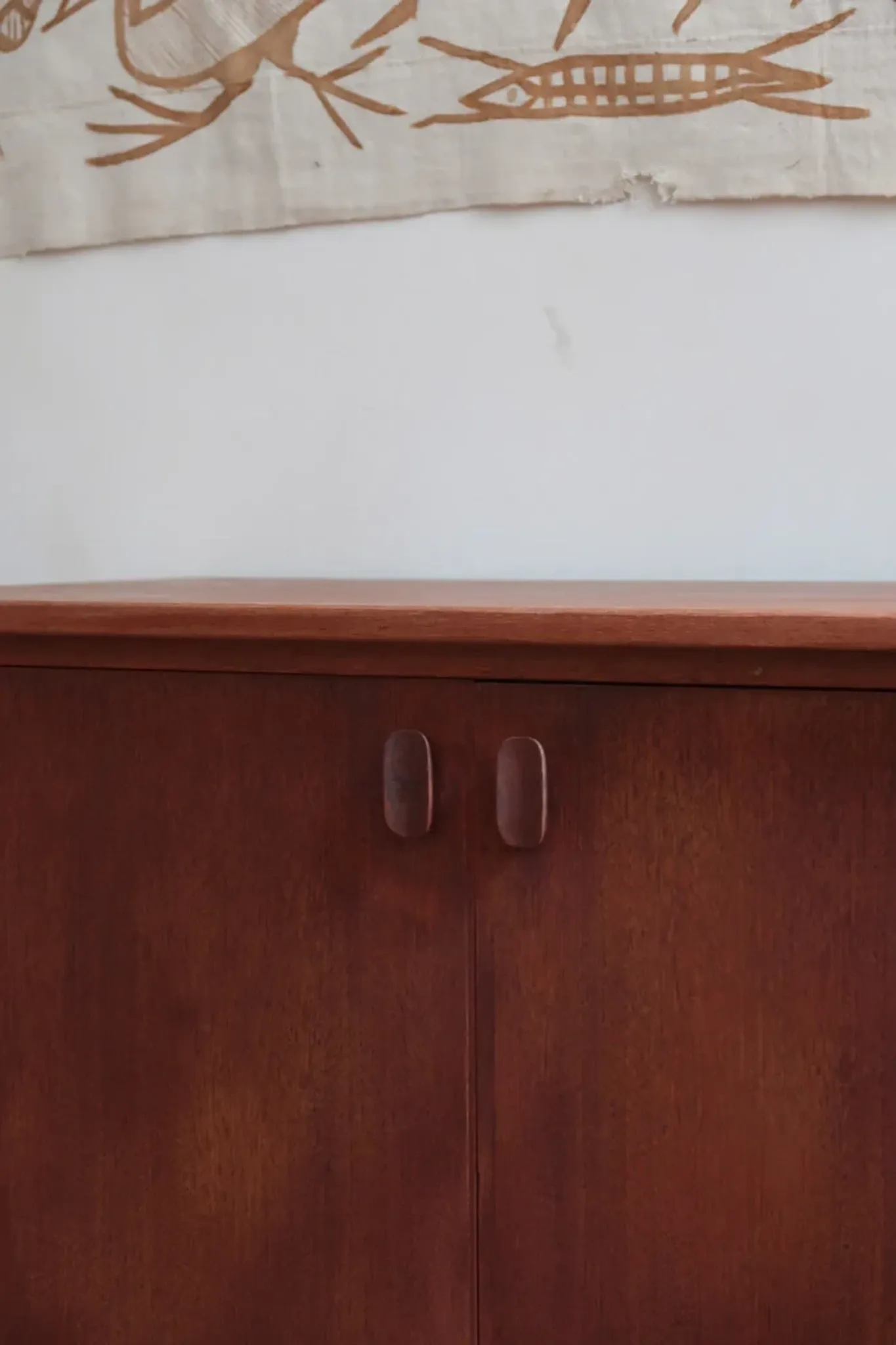 Small Ulferts teak sideboard from the 1960s with integrated handles.