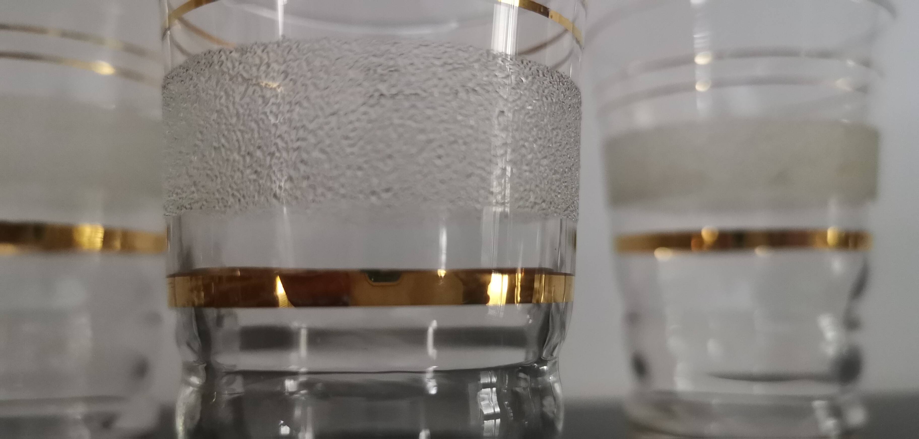 Set of 5 water glasses and 5 aperitif glasses with granite decorations and gold edging from the 1950s