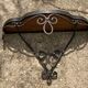 Old wrought iron console with a fleur-de-lis design.