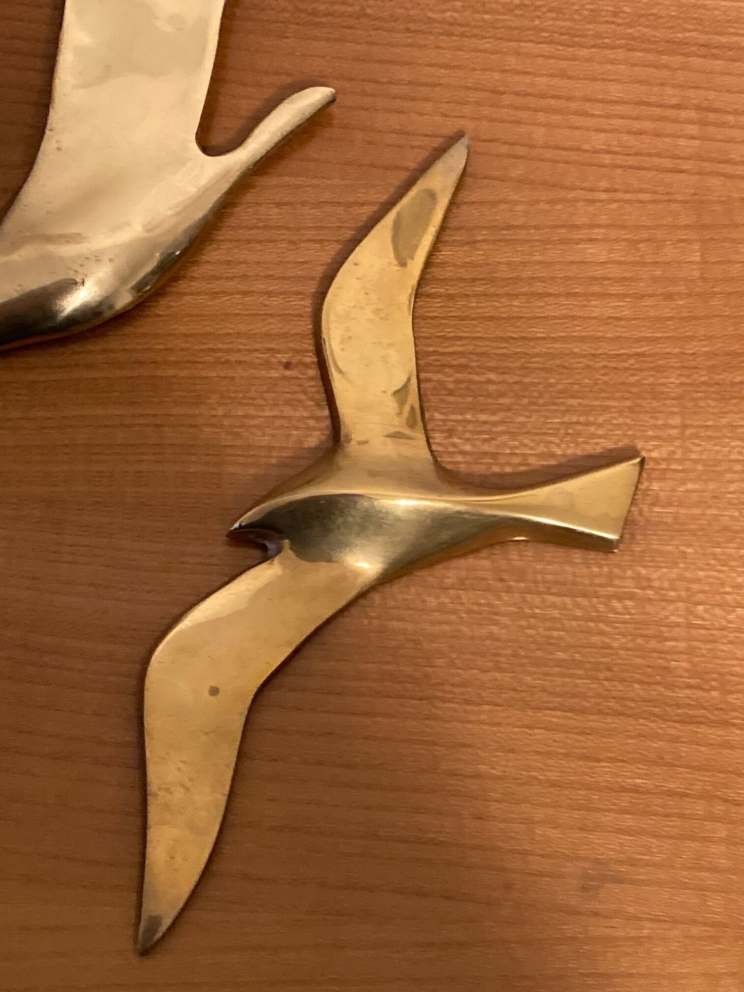 Set of two brass birds to hang
