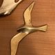 Set of two brass birds to hang