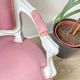 Pink Louis XV style convertible armchair in weathered wood for children