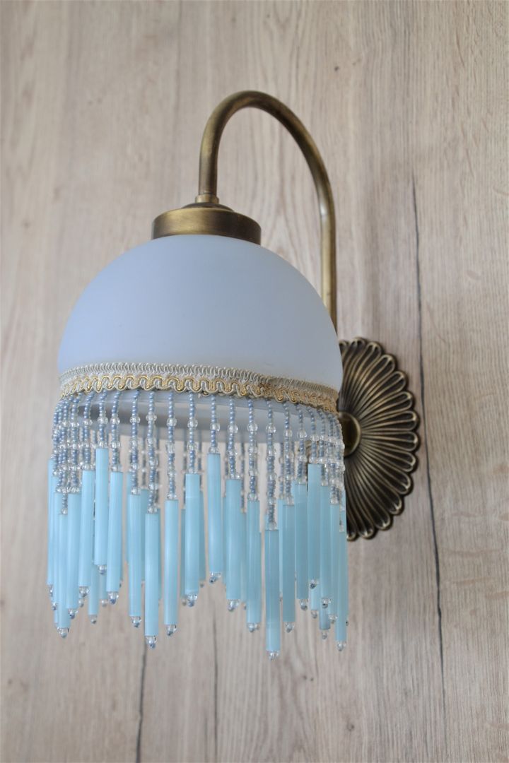 Blue wall lamp with pearl fringes