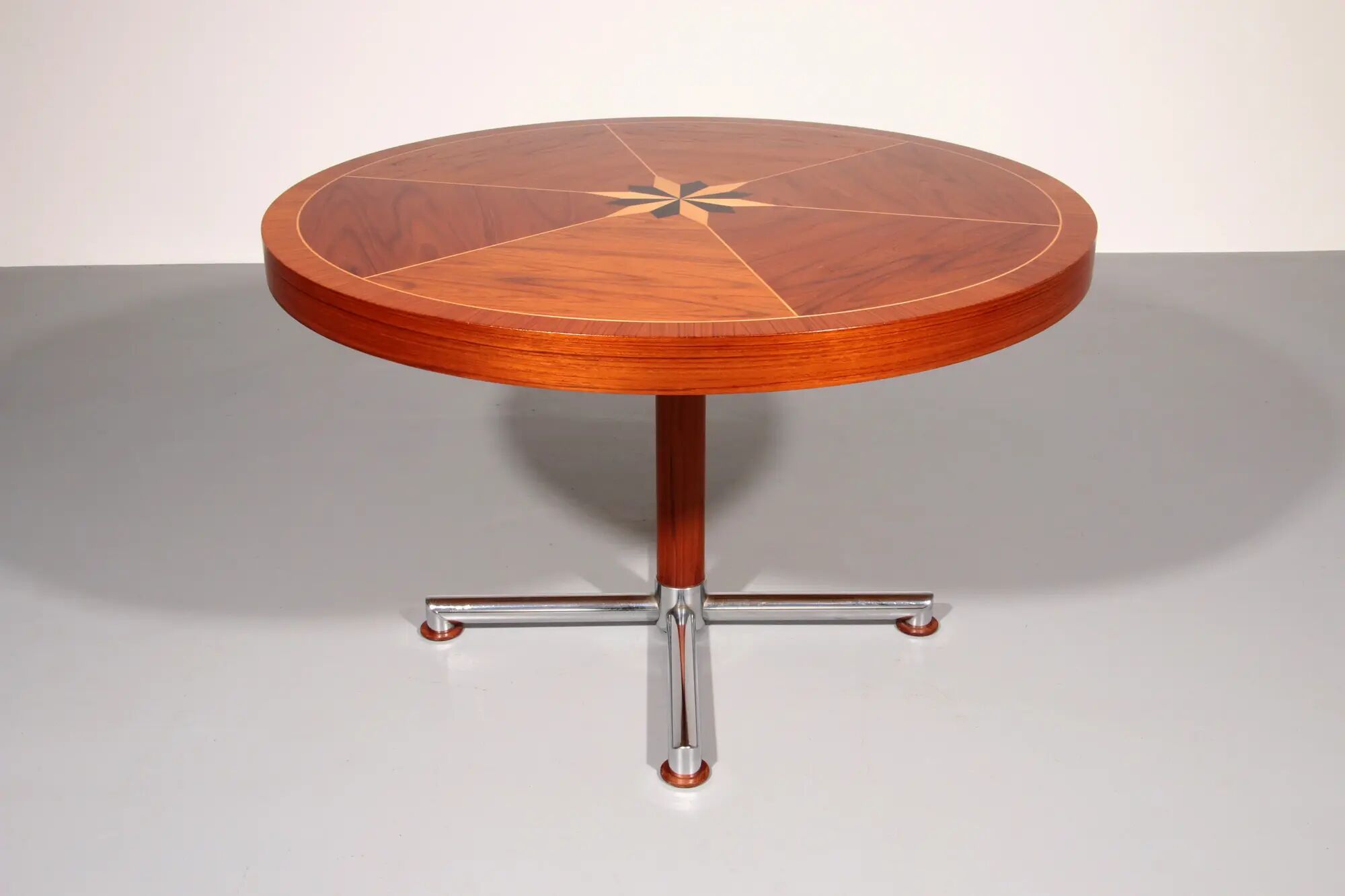 Italian mid-century dining table with stunning inlay star